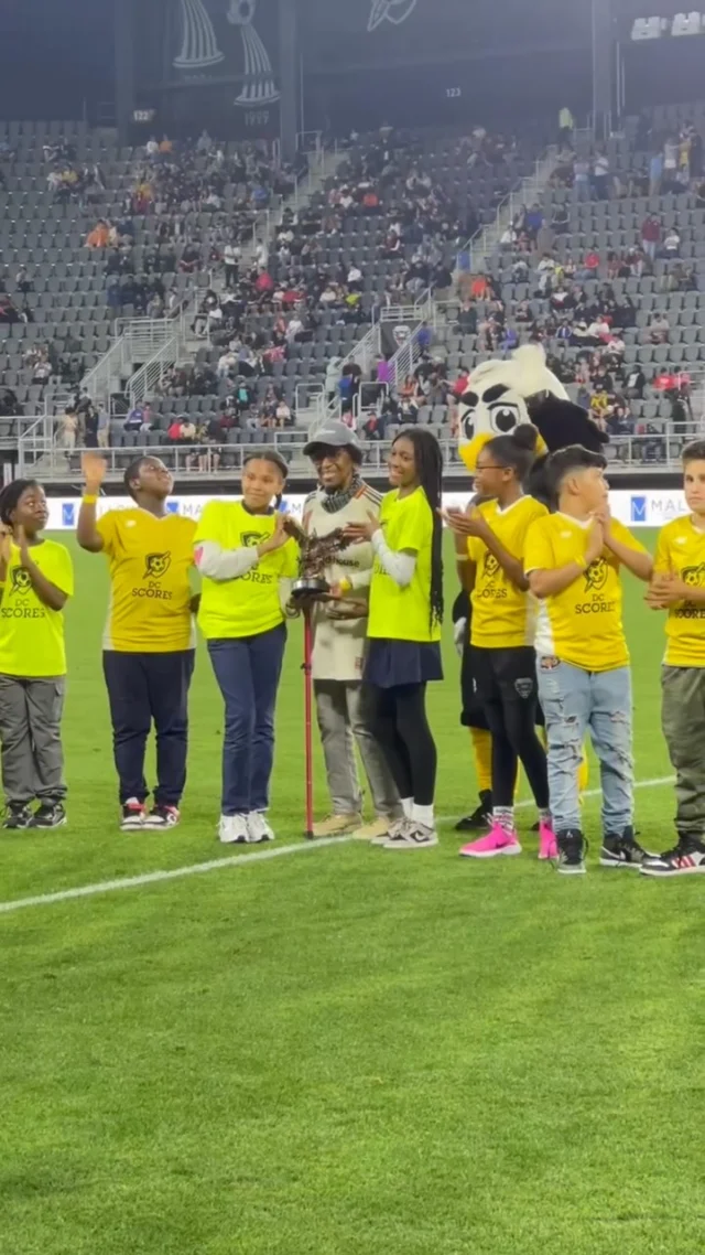 DC SCORES poetry coach. Beloved teacher. Civil rights activist. And @dcunited Community Champion!

Yesterday at Kids’ Day, the Black and Red honored DC SCORES coach and @lbesdc teacher Joyce Hill for her decades of service to young people in DC. Kitted out in a custom D.C. United jersey (and DC SCORES hat! 😉), Coach Hill led the pre-match banner procession and received her Community Champion award on field, all with her poet-athletes by her side. 

Thank you for your service, Coach Hill. You truly embody what it means to be a DC SCORES coach and educator and we can’t think of anyone more deserving of this recognition! ❤️

Read more about Coach Hill at the link 🔗 in bio.